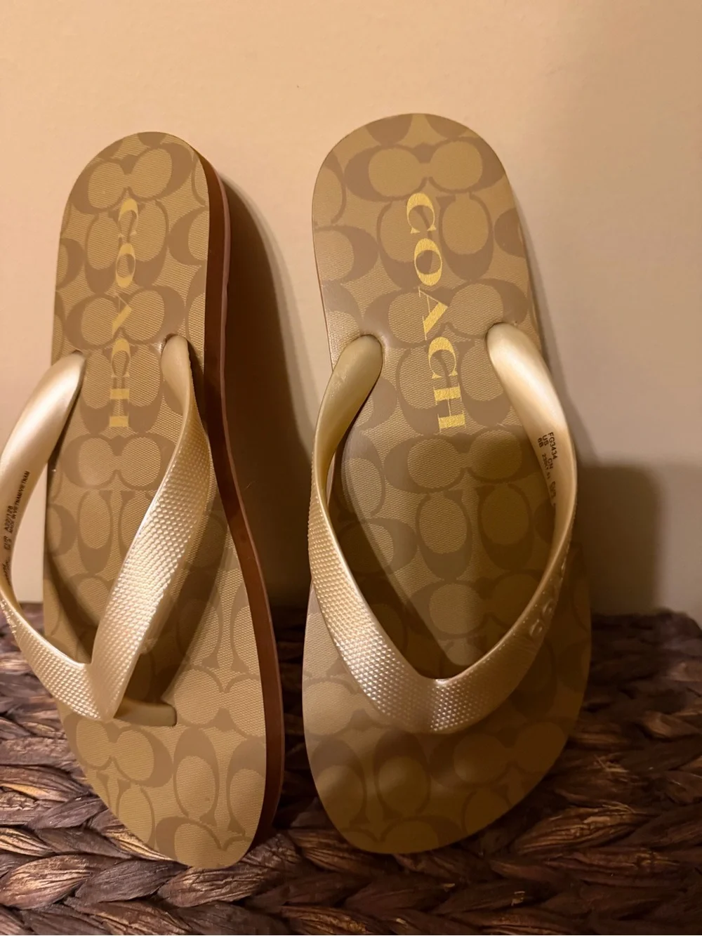 Coach Signature Flip Flops in Gold